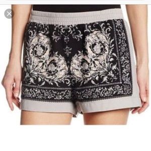 BCBG black print Issac pullon shorts.  See photos for detailed description.